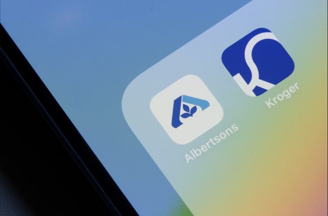 Pictures in detail of mobile phone and Albertsons and Kroger App Icon