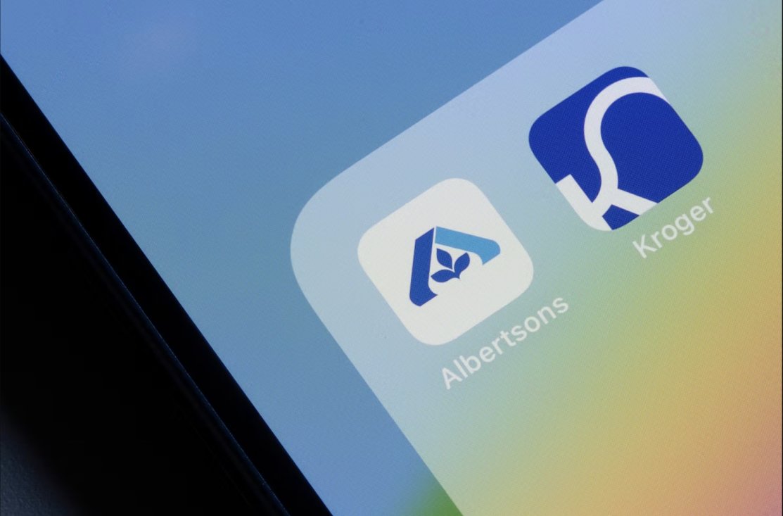 Pictures in detail of mobile phone and Albertsons and Kroger App Icon